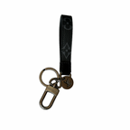 Black keychain with metal clasp and logo on a white background